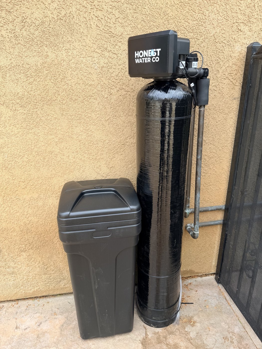 Honest Water Co outdoor water softener and brine tank installation in Southern California